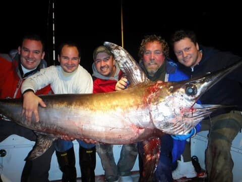 The crew holding one of the biggest fish landed on KielBaSSEA